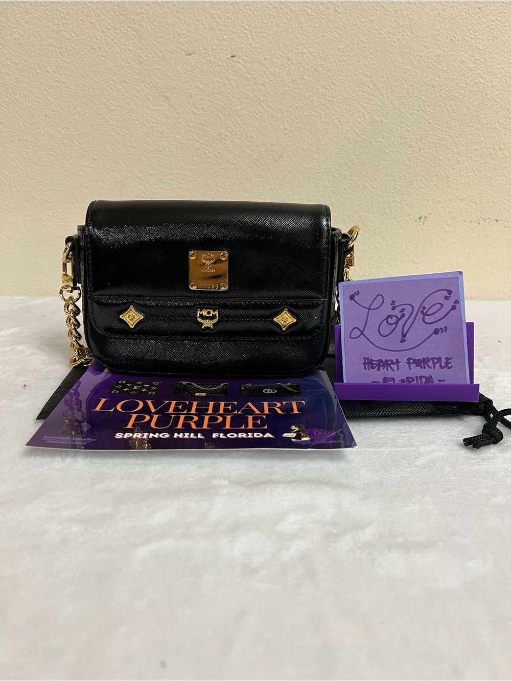 MCM PATENT SHOULDER BAG BLACK